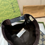 Gucci cap interior with adjustable strap, buckle, and hanging tag