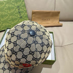 Gucci cap in blue GG canvas with round top button and textured brim