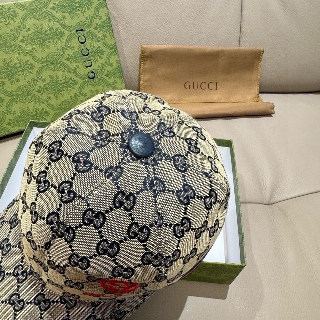 Gucci cap in blue GG canvas with round top button and textured brim