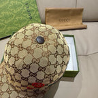 Gucci cap in beige GG canvas with round dark button on crown