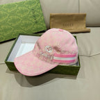 Gucci pink baseball cap with GG logo pattern and pink striped front band