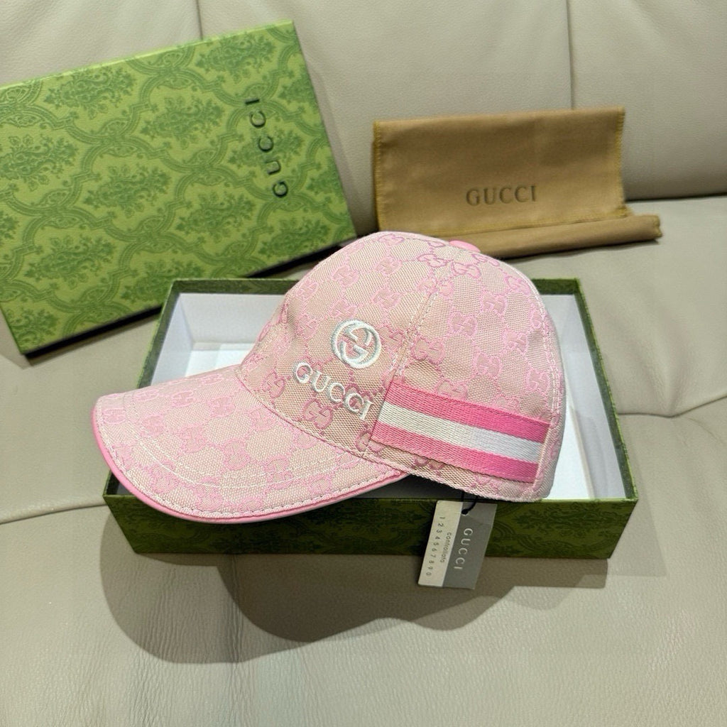 Gucci pink baseball cap, side view, GG pattern with pink and white striped band