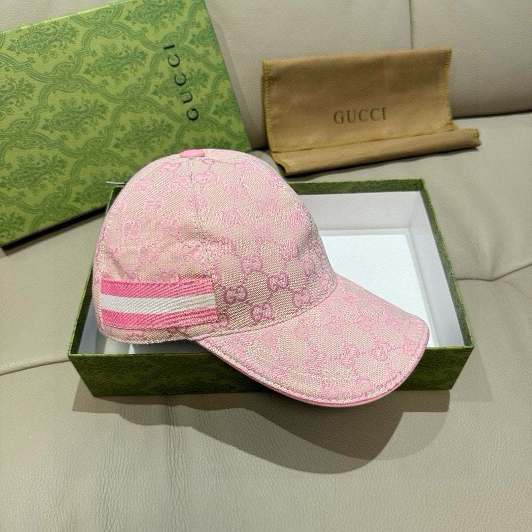 Gucci pink baseball cap with GG pattern and pink-and-white striped band