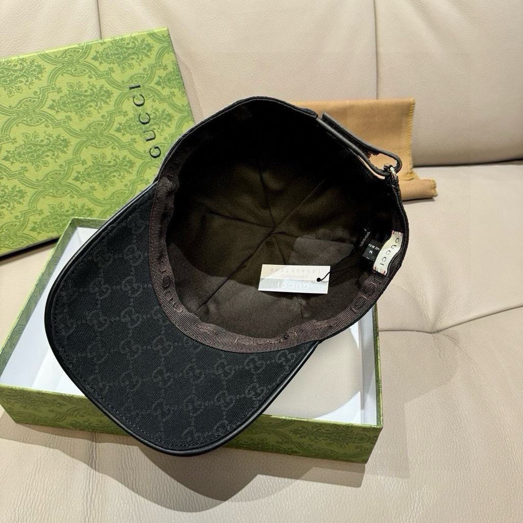 Black Gucci GG cap interior with curved brim and adjustable strap hardware
