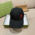 Black Gucci GG monogram baseball cap with red Interlocking G emblem and multicolor band