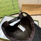 Black Gucci GG cap interior with adjustable strap and Gucci label tabs