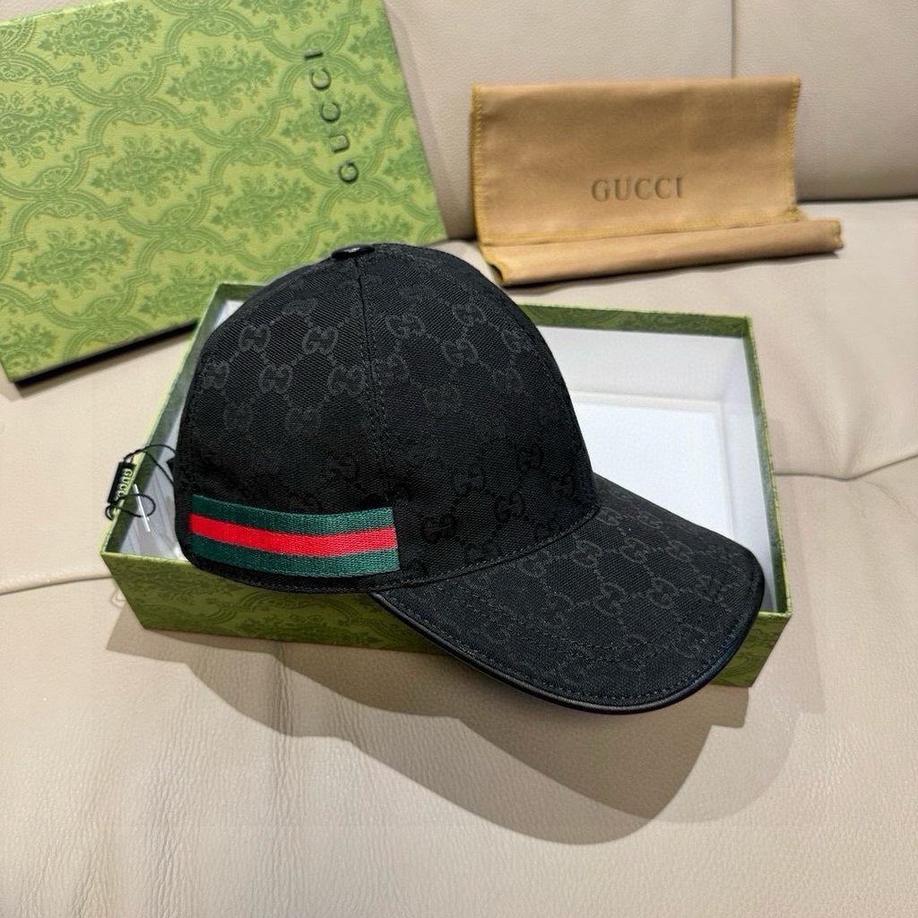 Black Gucci GG baseball cap with green-red stripe panel and red Interlocking G