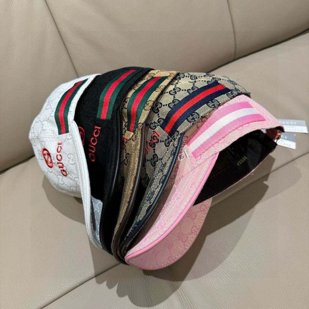 Assorted Gucci GG baseball caps with multicolor striped bands