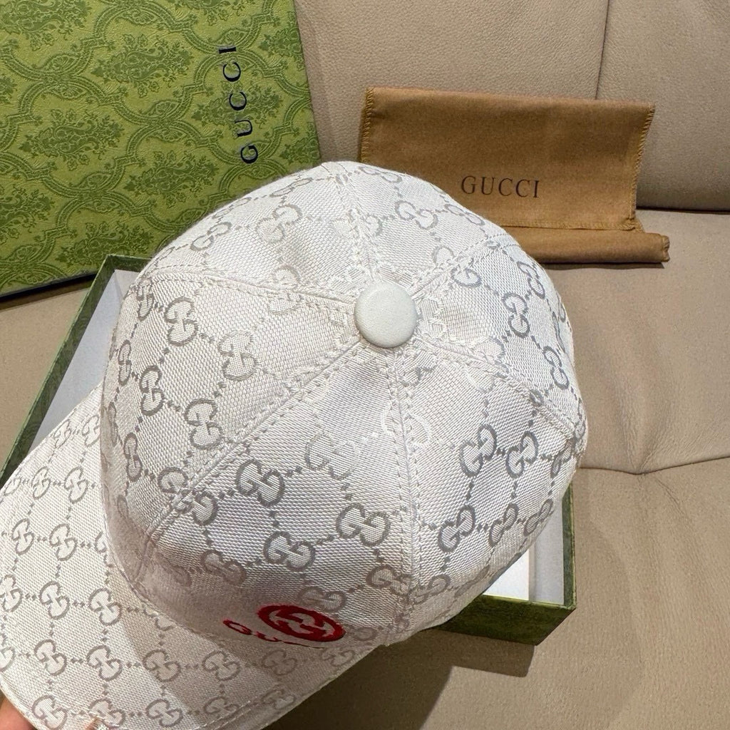 White GG-print baseball cap with round button detail on back
