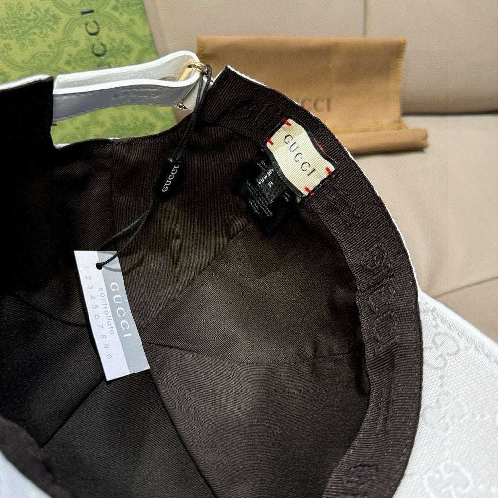 Black-lined baseball cap interior with leather trim and Gucci brand label