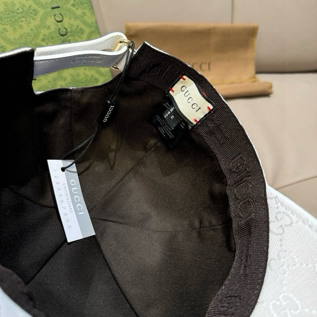 Black-lined baseball cap interior with leather trim and Gucci brand label