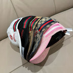Multicolor striped baseball cap with GG canvas and pink lining interior view