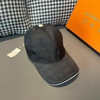 Baseball cap in dark charcoal, curved brim with visible stitched crown