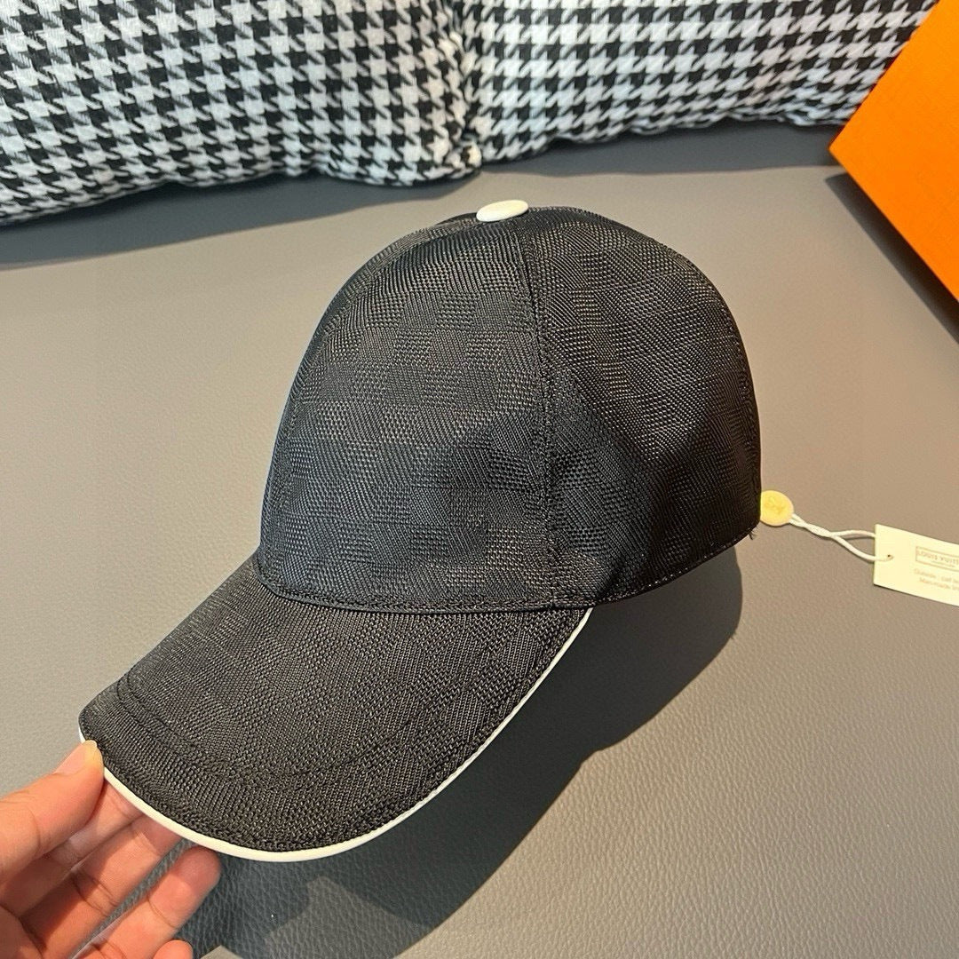 Baseball cap in dark charcoal with contrast white-trim brim
