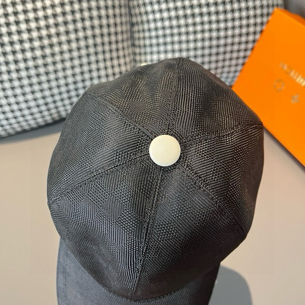 Baseball cap in dark charcoal with round top button and stitched crown detail