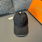 Baseball cap in dark charcoal with curved brim and small top button