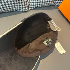 Louis Vuitton baseball cap interior shown, with brown lining and brand tag