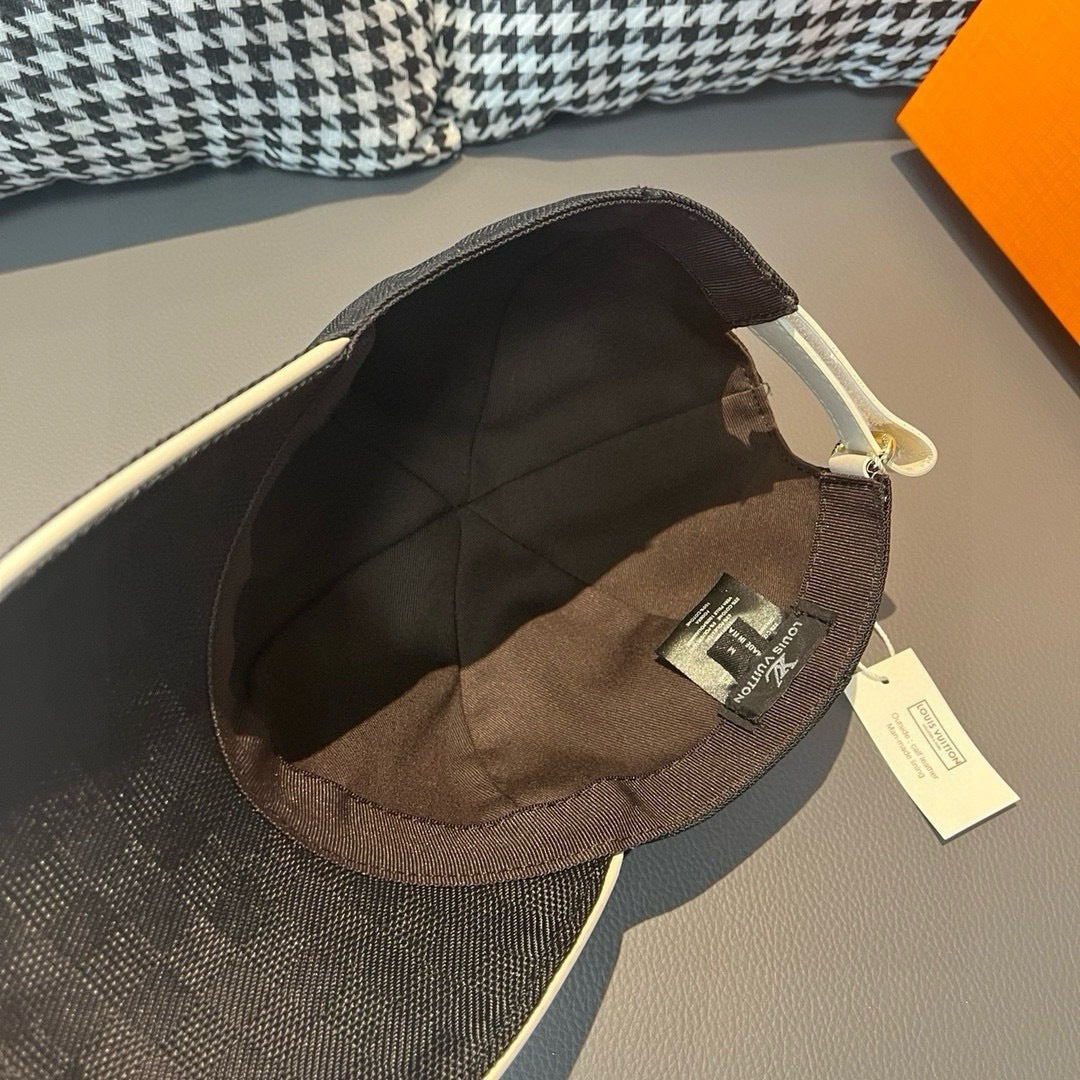 Louis Vuitton baseball cap interior shown, with brown lining and brand tag