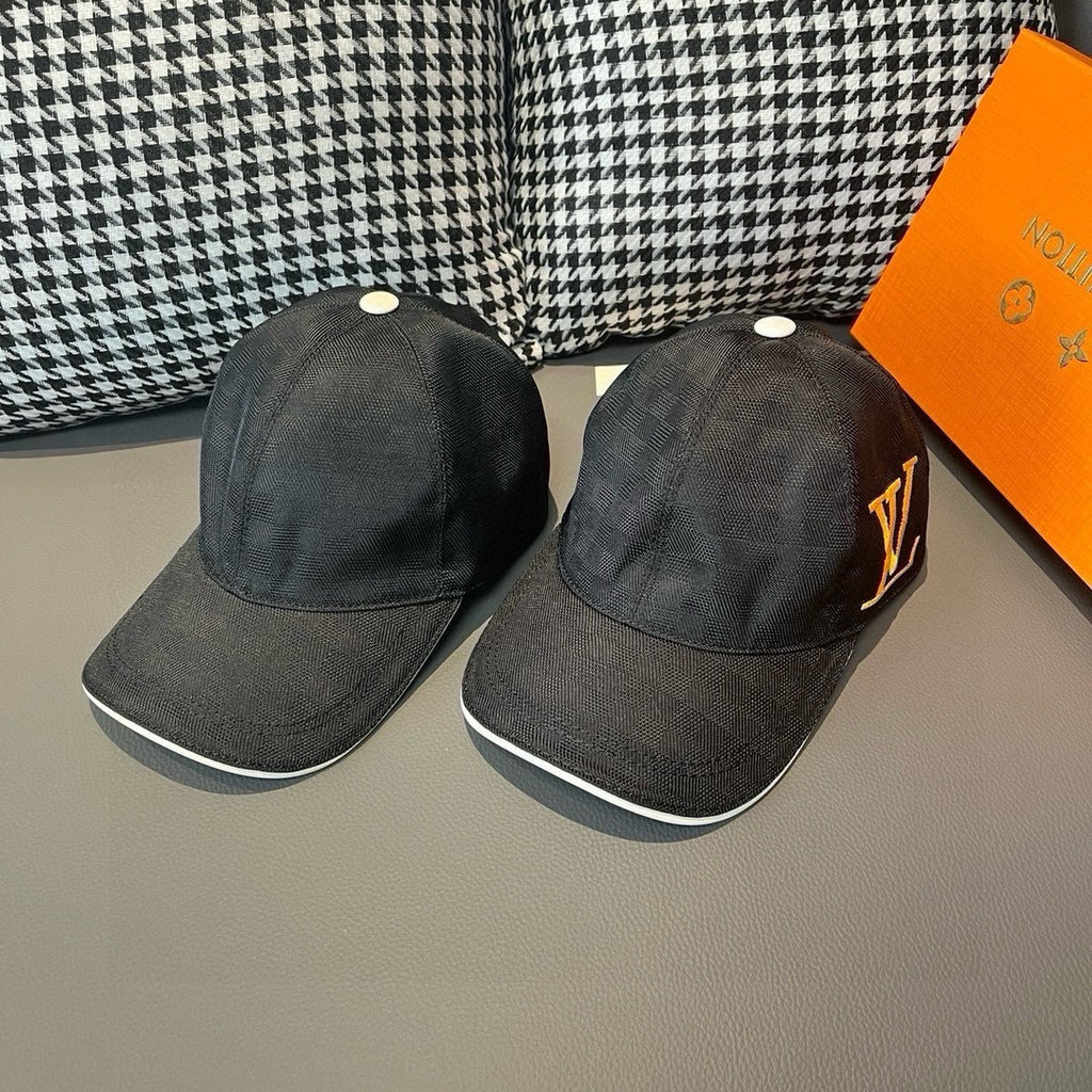 Pair of dark charcoal baseball caps with curved brims and small top buttons