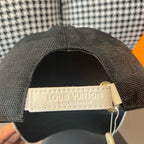 Louis Vuitton cap interior label on adjustable strap inside crown