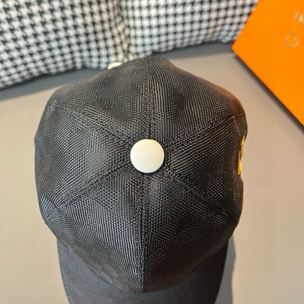 Louis Vuitton cap, dark gray with white snap button at crown