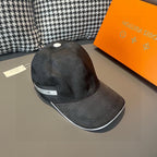 Dark gray baseball cap with white button, curved brim, stitched side logo patch