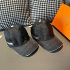 Two dark gray baseball caps with white buttons and curved brims, side-by-side