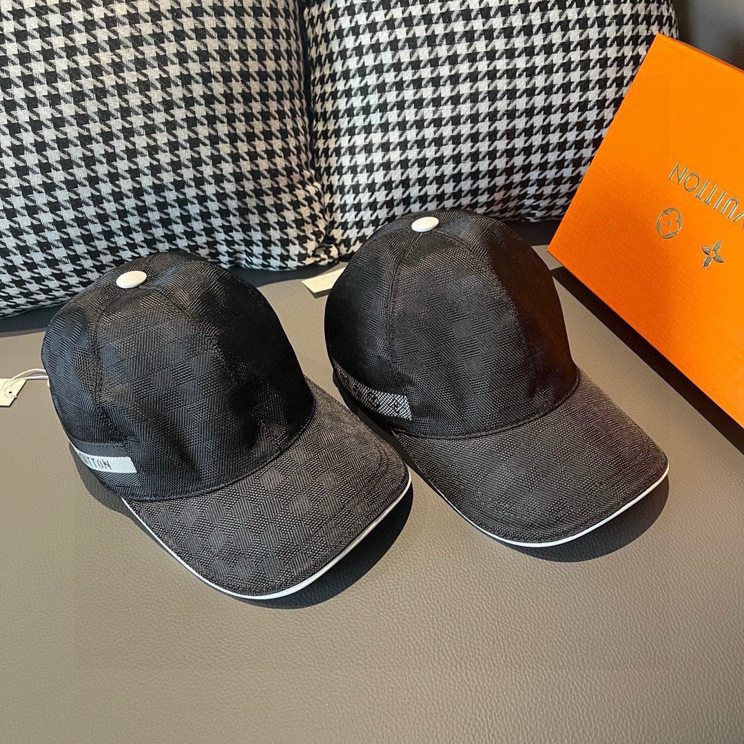 Two dark gray baseball caps with white buttons and curved brims, side-by-side