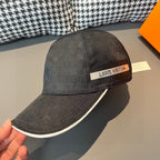 Dark gray baseball cap with white button and white logo band on brim side