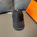 Dark baseball cap with curved brim and small white top button, back view
