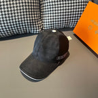 Dark baseball cap with curved brim and small white top button