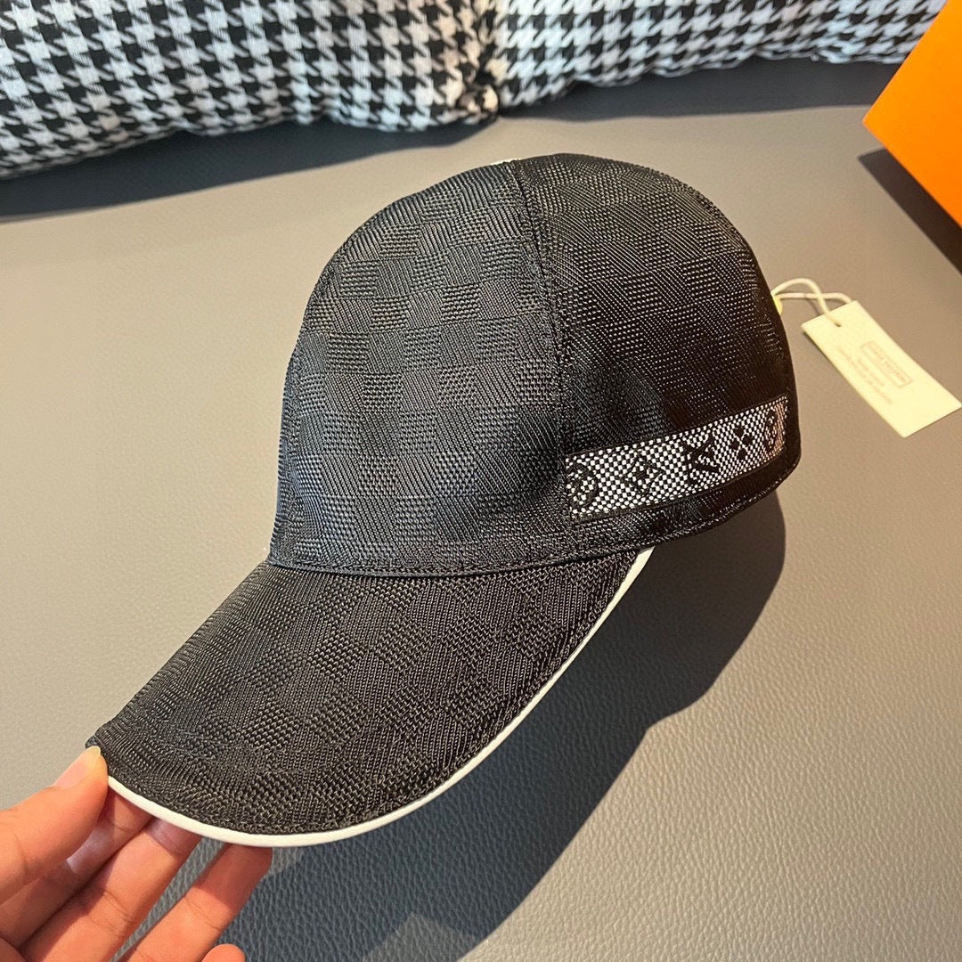 Dark baseball cap with geometric patterned band along the brim
