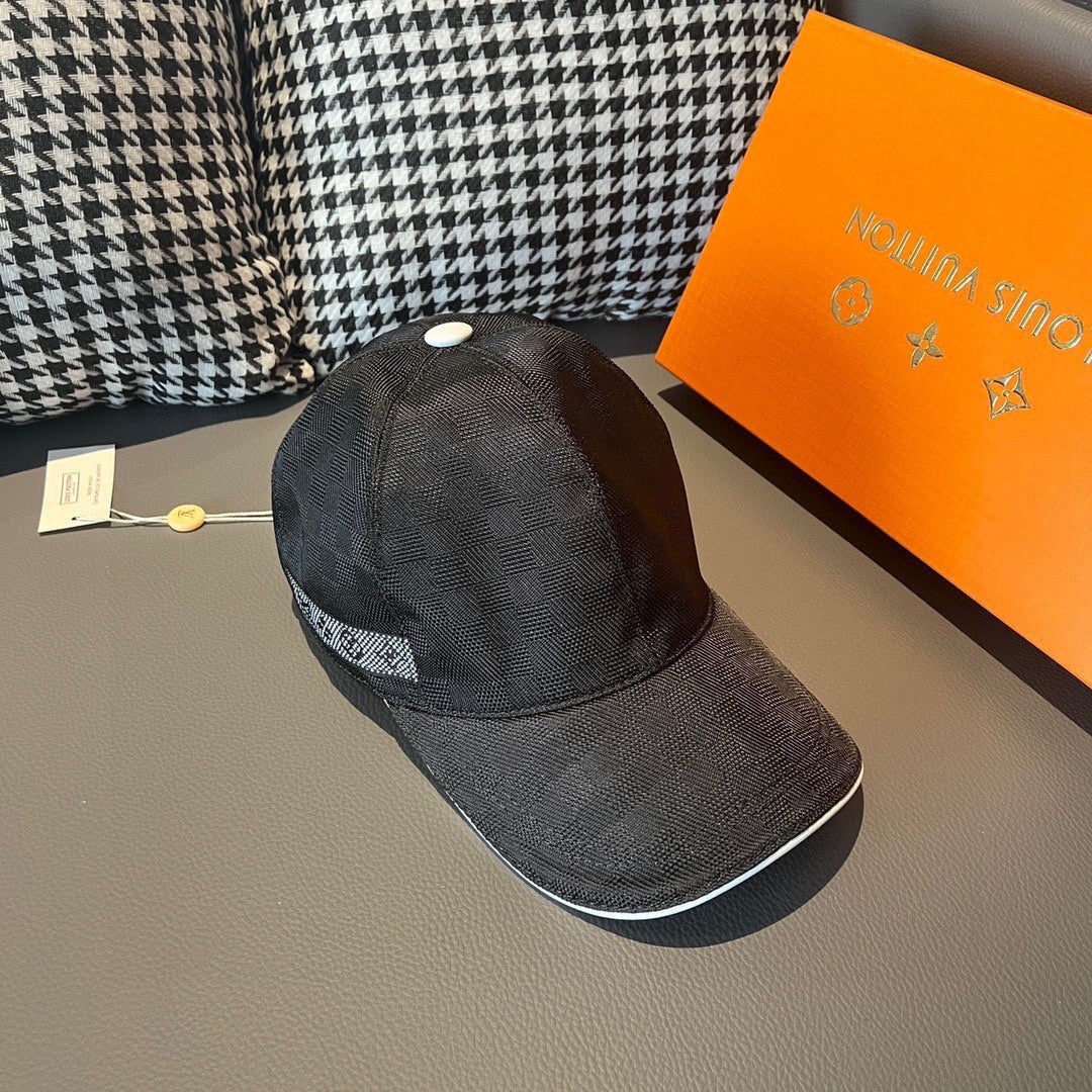 Dark baseball cap with curved brim and small white top button, angled view