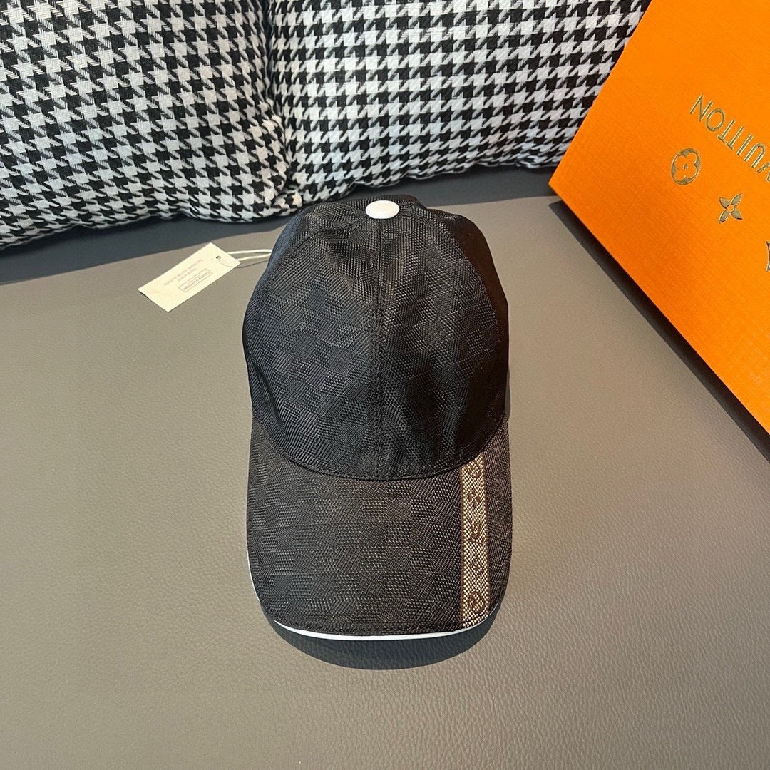 Louis Vuitton dark cap with white top button and textured brim.