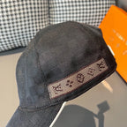 Baseball cap front view, dark textured fabric with patterned band detail