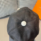 Baseball cap, dark textured crown, white round button at back