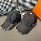 Pair of baseball caps, dark textured fabric, white top buttons, patterned bands