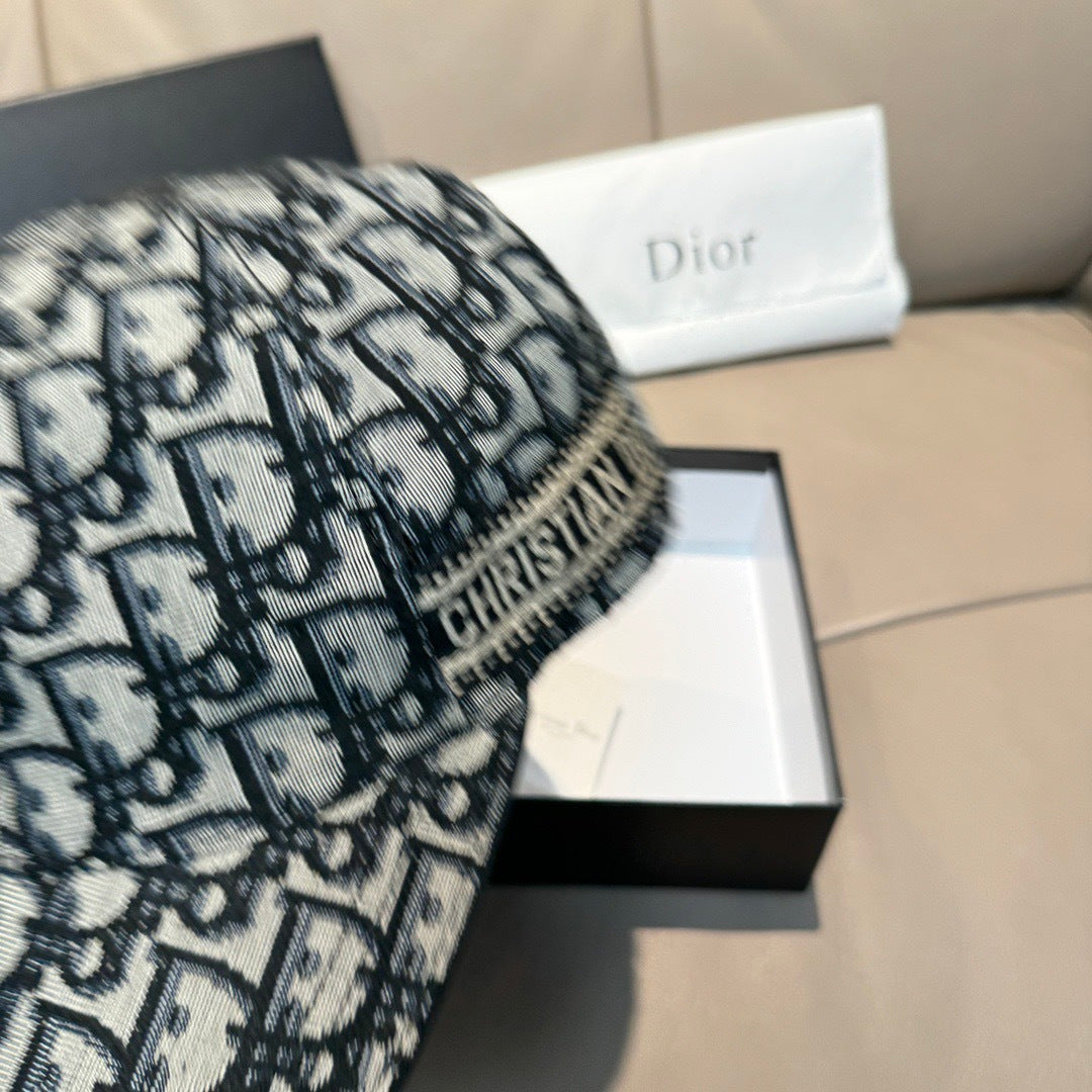 Dior cap close-up of black-and-white Dior monogram fabric, curved brim