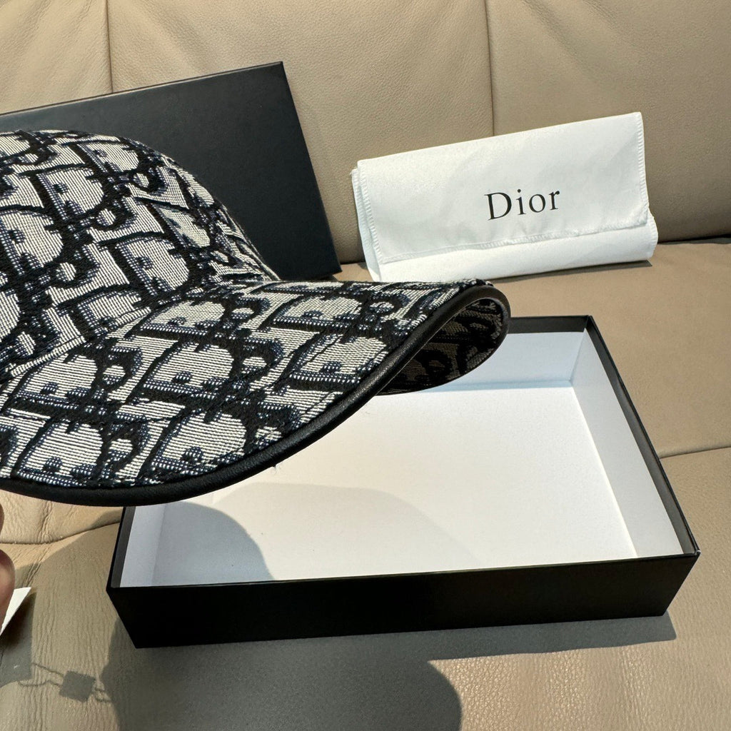 Dior cap with black-and-white monogram fabric, side view and curved brim