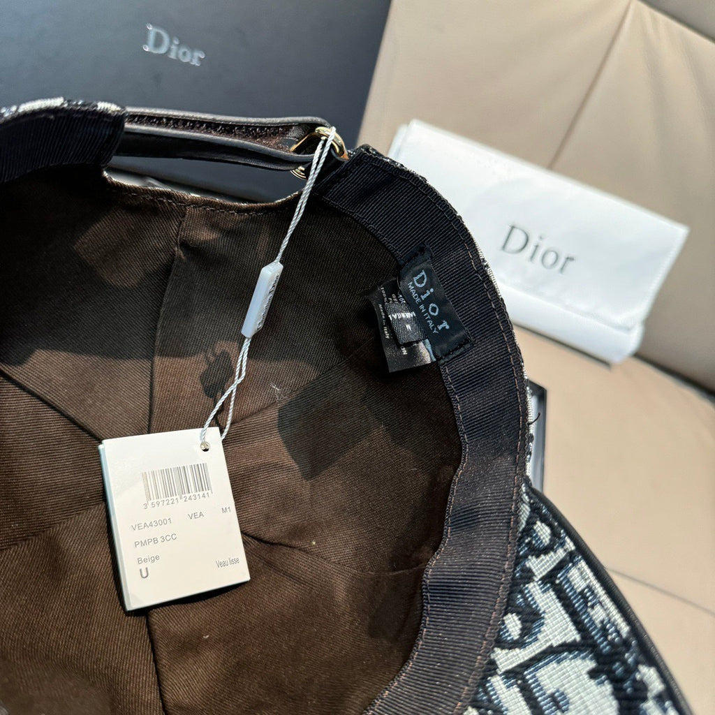 Dior cap interior lining with black strap and hanging retail tags
