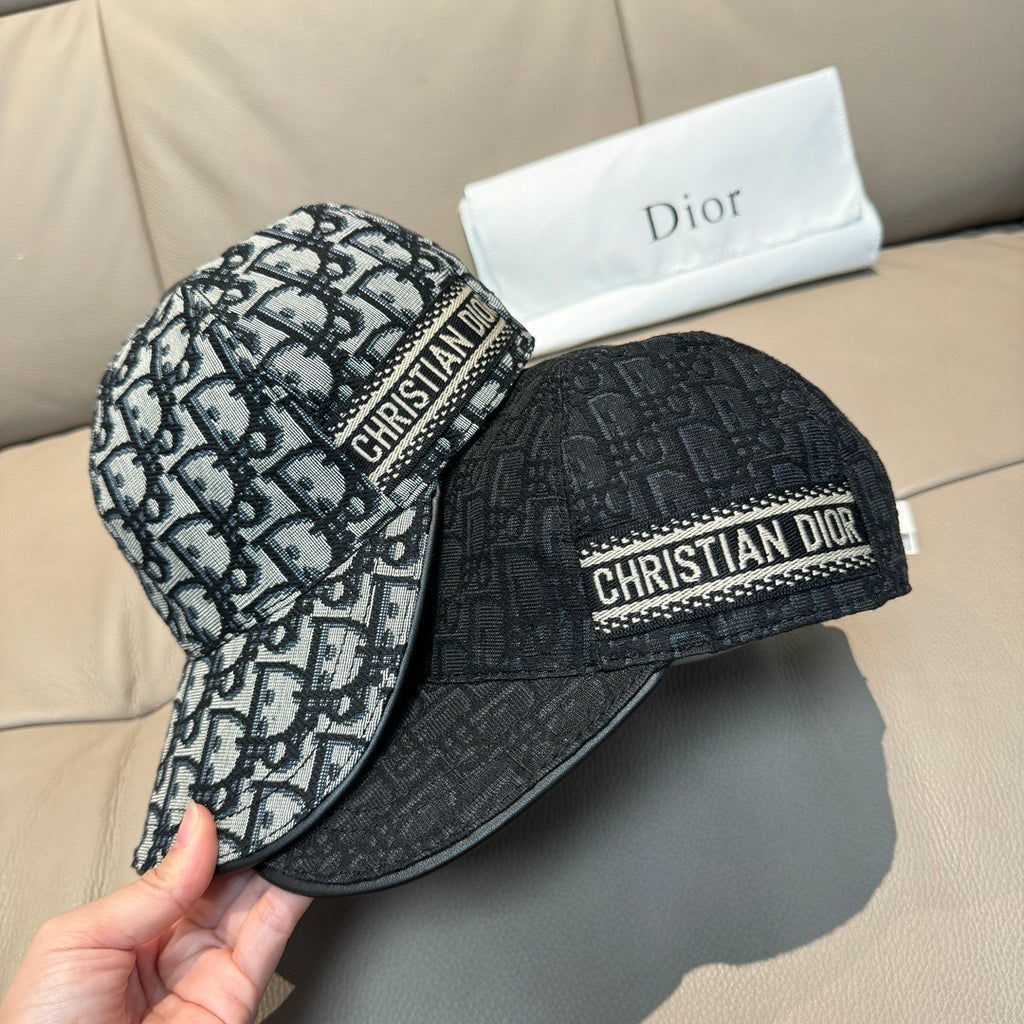 Dior bucket-style cap with two-tone monogram panels and “CHRISTIAN DIOR” label