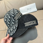 Dior bucket-style cap with two-tone monogram panels and “CHRISTIAN DIOR” label