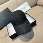 Dior black monogram baseball cap with curved brim and stitched paneling