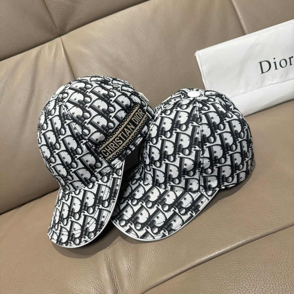Pair of Dior baseball caps in black-and-white monogram pattern