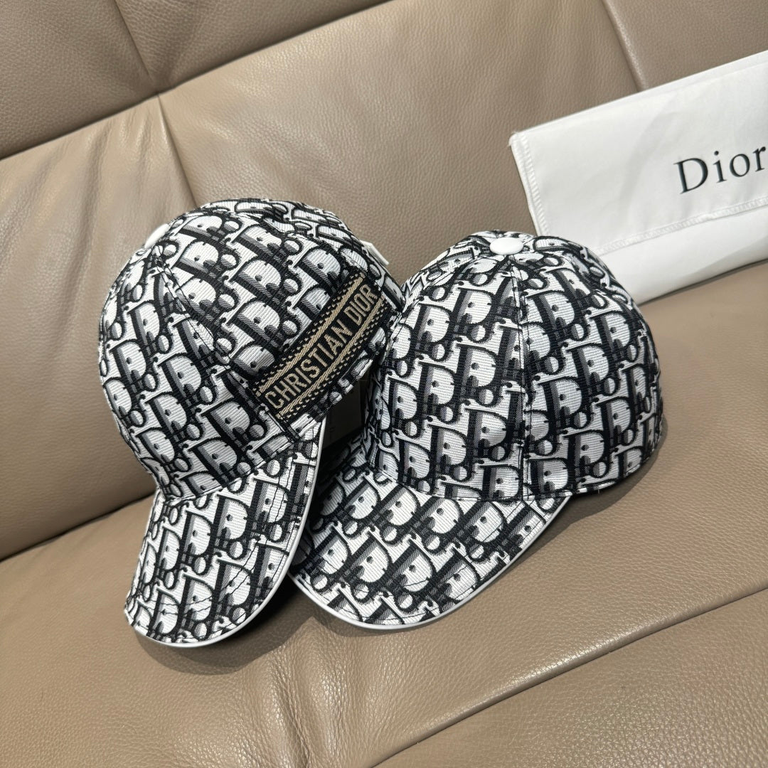 Pair of Dior baseball caps in black-and-white monogram pattern