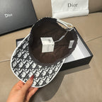 Dior cap interior view with brown lining and black-and-white monogram fabric brim