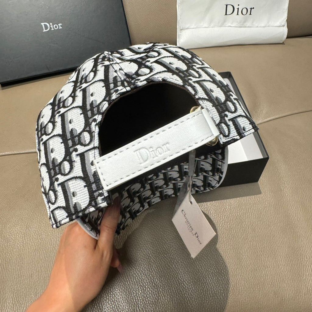 Dior baseball cap interior, white Dior patch on black lining, adjustable strap.