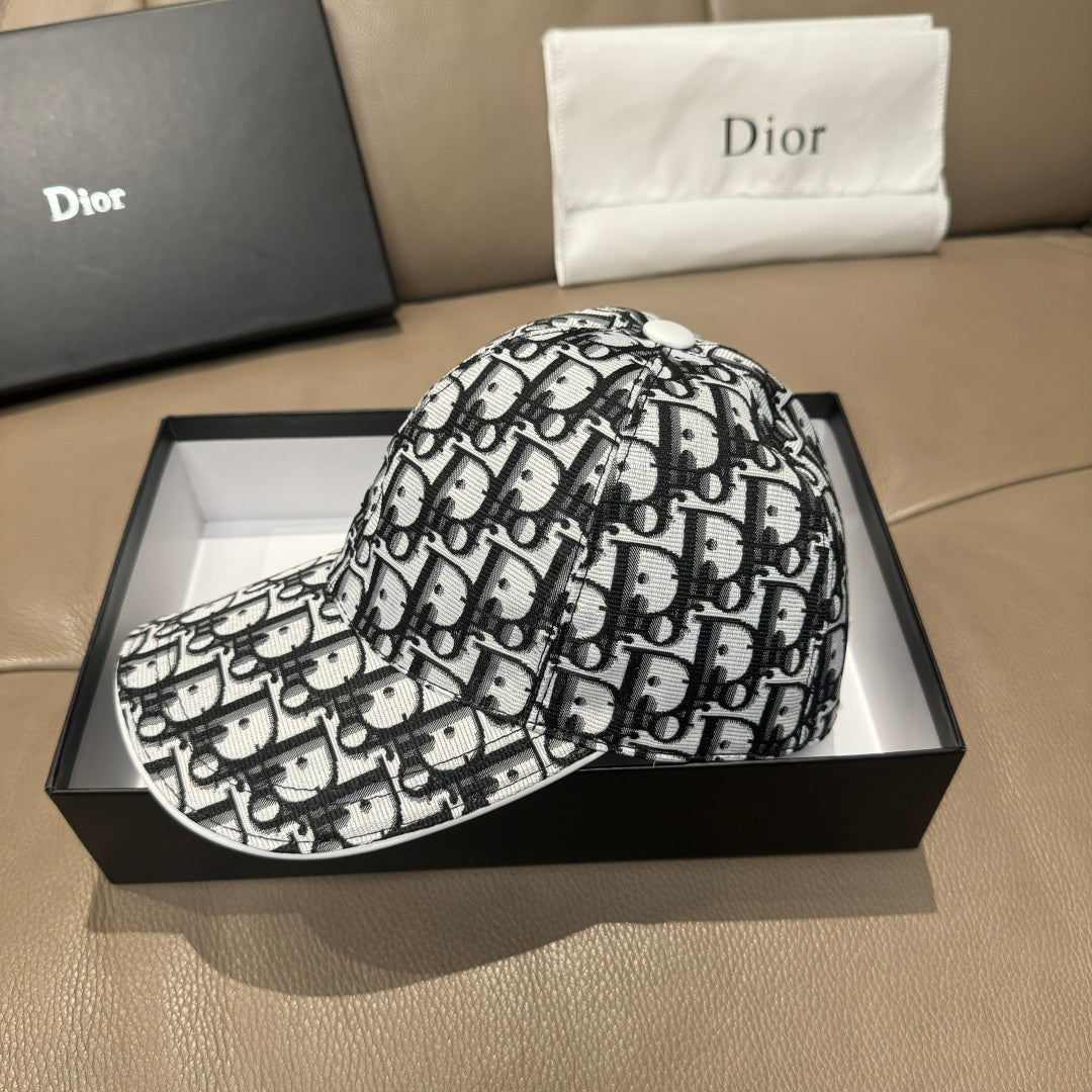 Dior baseball cap with black-and-white Dior pattern, curved brim, fabric strap.