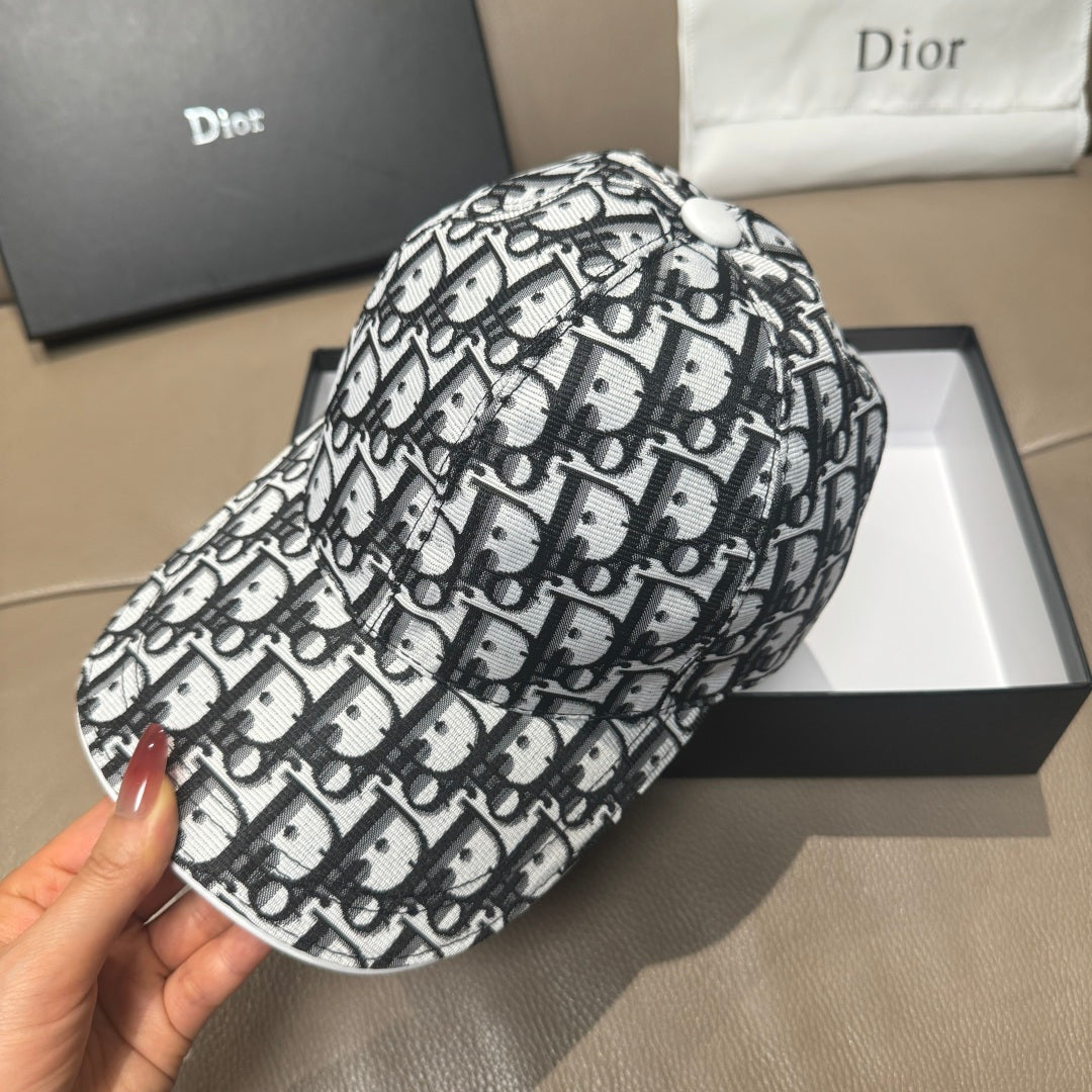 Dior baseball cap side view, black-and-white Dior pattern, curved brim.