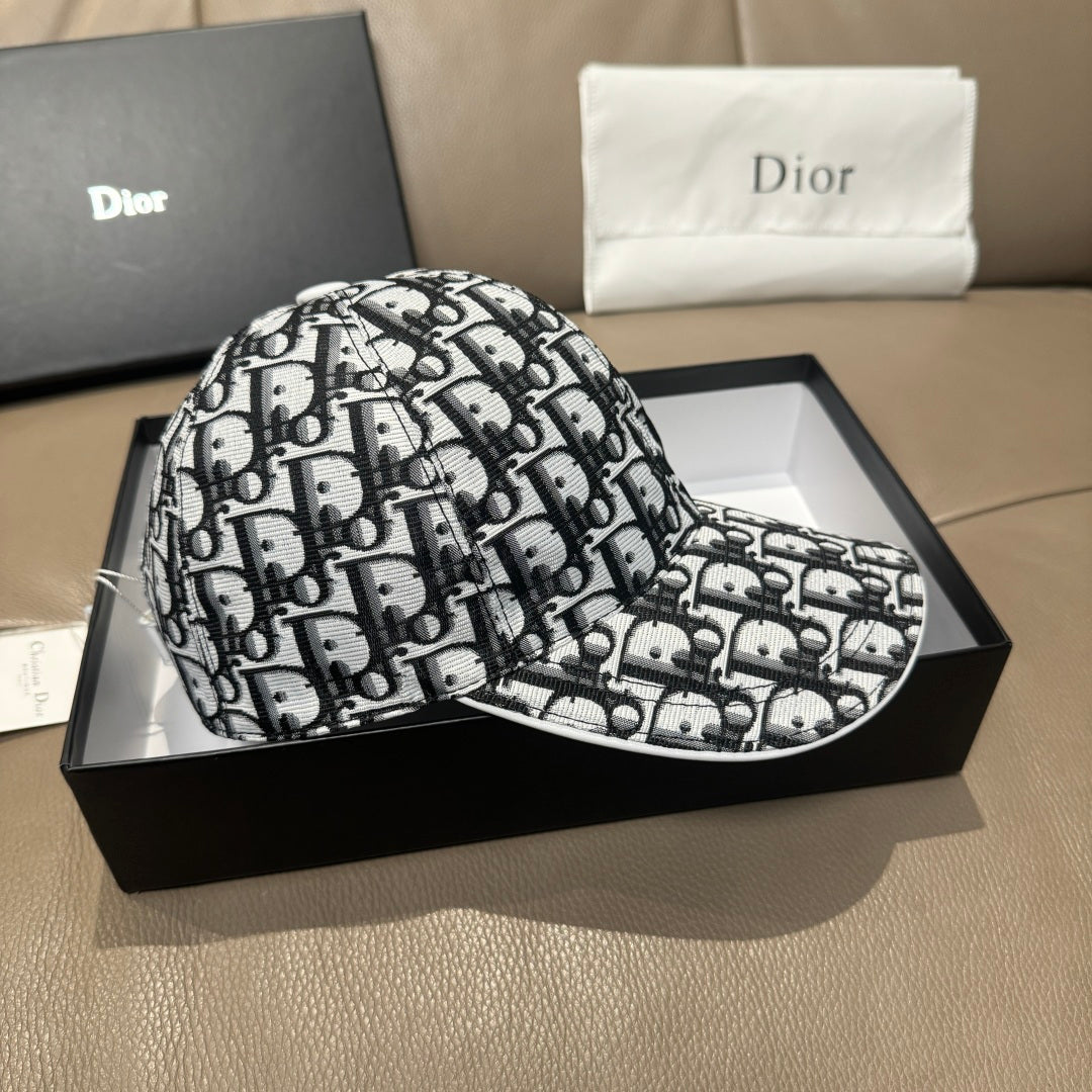 Dior baseball cap in box, black-and-white Dior monogram pattern, curved brim.